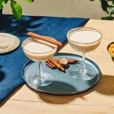 Top view of delicious Brandy Alexander Cocktails garnished with cinnamon sticks