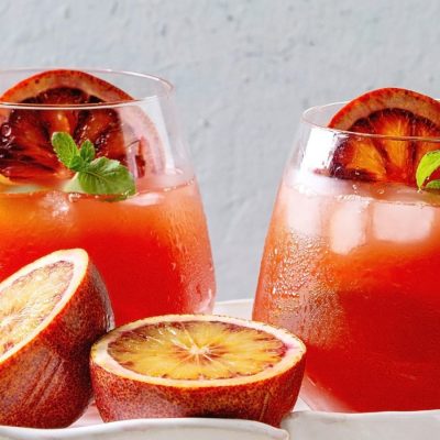Blood Orange vodka cocktails with mint in tumblers