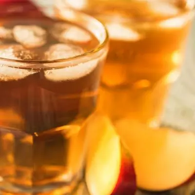 Close up of a glass of Bourbon Apple Cider Cocktail