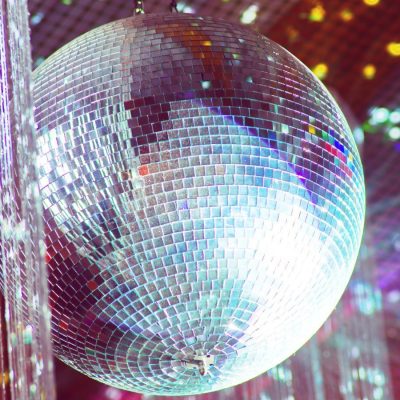 Image of disco ball and colorful lighting
