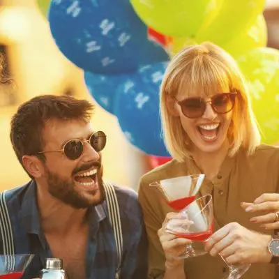 Group of friends enjoying a rooftop cocktail party