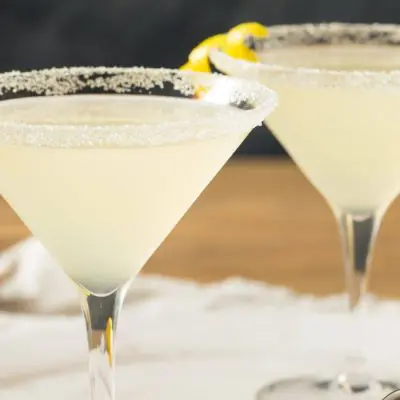 Limoncello martini in cocktail glasses with a lemon twist