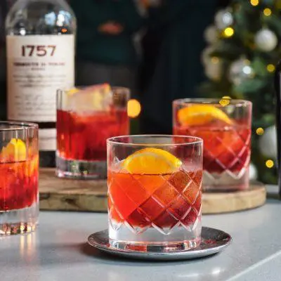 Negroni Cocktails with orange garnish made with Campari, Cinzano vermouth and Bulldog Gin