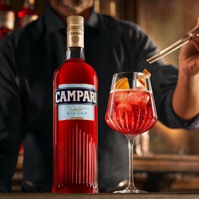 A bartender making a Campari Spritz cocktail