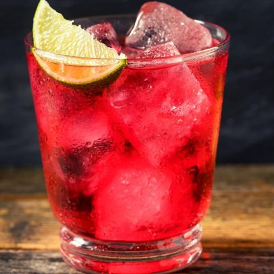 Bright and refreshing vodka cranberry on ice with lime