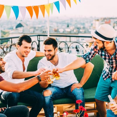 Five friends toasting on a bachelor party