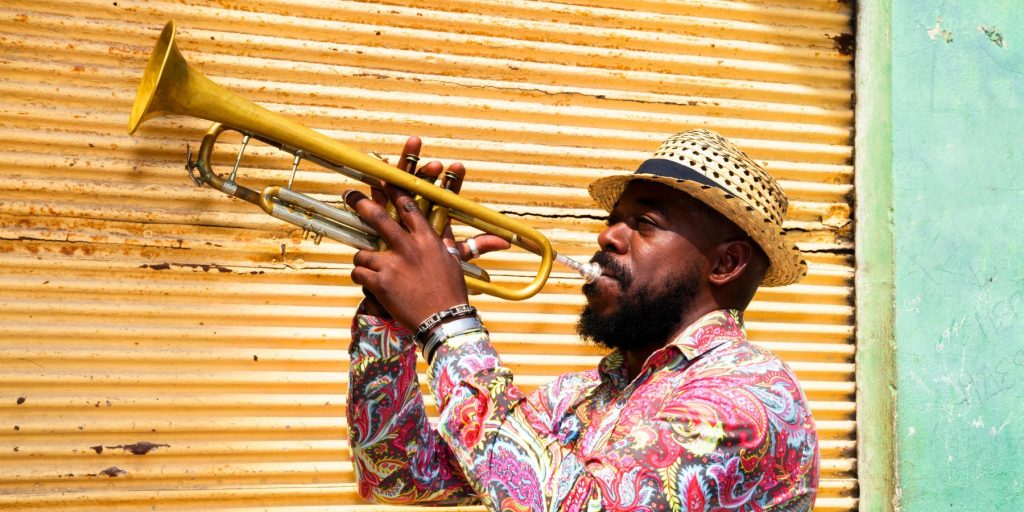 A musician playing Cuban music to enjoy at a cocktail party