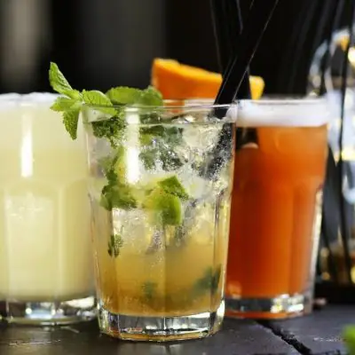 Refreshing and colorful bourbon cocktails in highball glasses