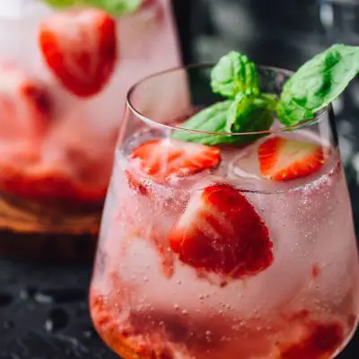 Front view of Strawberry Gin Cocktail garnished with fresh strawberry