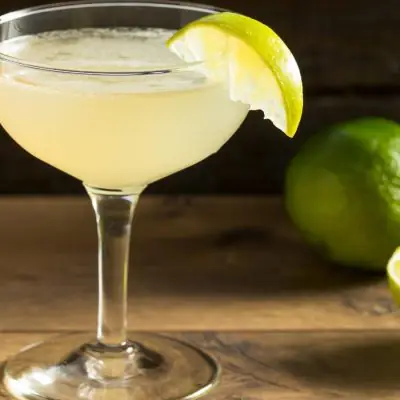 Classic Lime Daiquiri in coupe glass garnished with lime