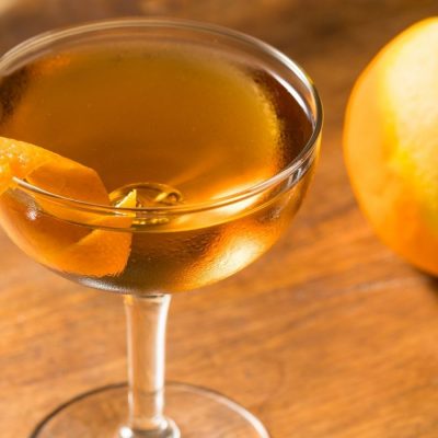 Hanky Panky cocktail garnished with an orange peel twist