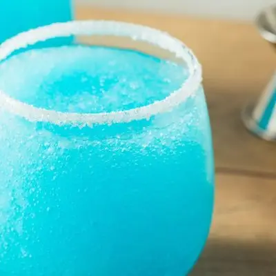 Close-up of bright blue Jack Frost cocktail