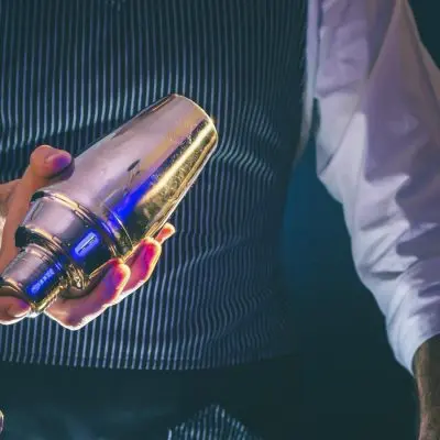 Bartender shaking a cocktail shaker