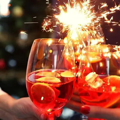 Aperol Spritz sparkly cocktails garnished with sparklers