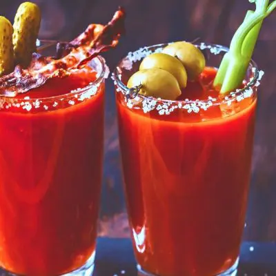 Kimchi Bloody Mary with bacon, pickle and celery garnish