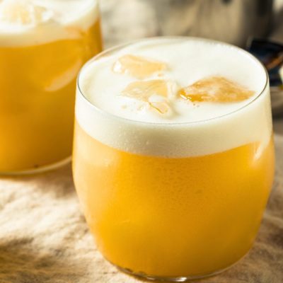 Tequila Sour with white foam on top