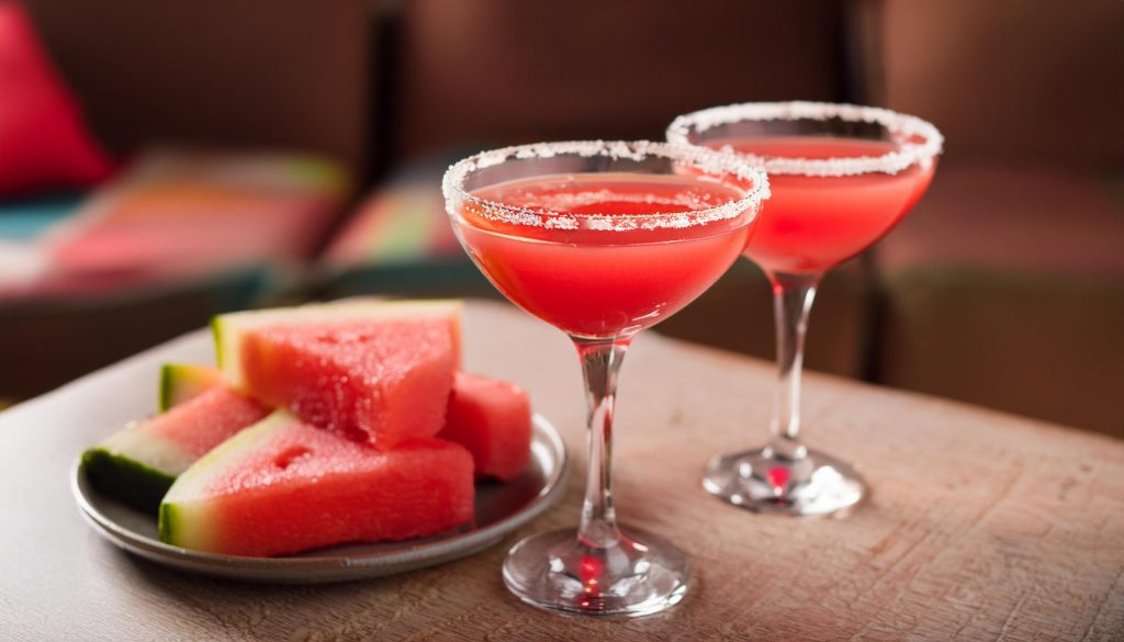 Two Watermelon Martinis with sugar rims 