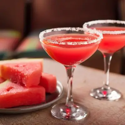 Two Watermelon Martinis with sugar rims