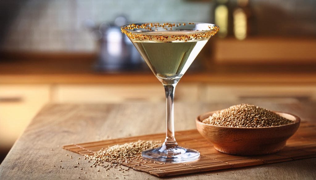 An Everything Bagel Martini with sesame seed rim