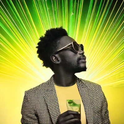 A Jamaican man holding a mojito, yellow and green lasers on the ceiling